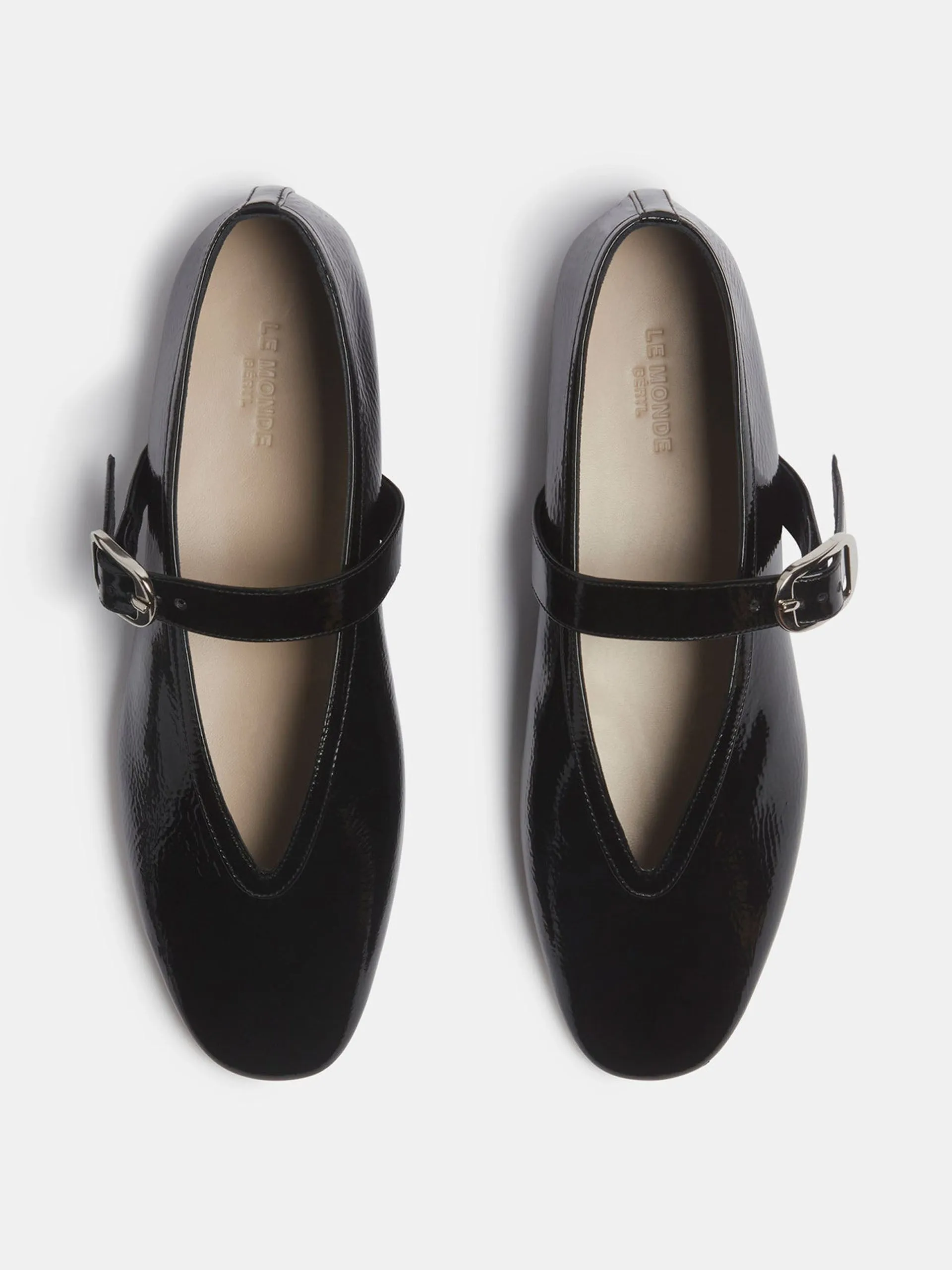 Black patent leather Stella slippers